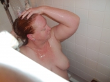 Redhead taking shower