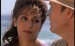 Marina Sirtis sexy on the beach showing us her great