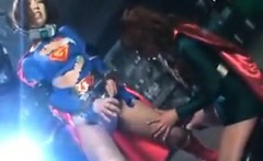 Super hero is put on a torture machine and an alien hurts h