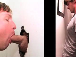 Blonde gay fellating giant dick on gloryhole