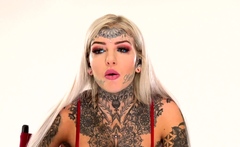 Behind the scenes for Amber Luke's new face tattoo