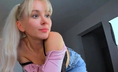 Blonde teen in solo action with her pussy