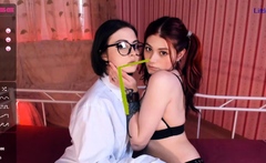 Redhead and brunette lesbians make out
