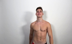 Muscle boy Jonathan Hicks shows his abs