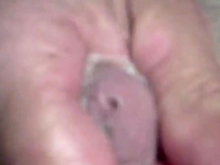 Twink's Webcam Handjob: Small Cock, Big Condom Fun