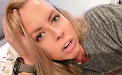 Blonde teen in solo action with her pussy
